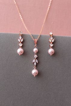 Pink Wedding Necklaces With Matching Earrings, Pink Bridal Necklace With Matching Earrings For Wedding, Pink Necklaces With Matching Earrings For Wedding, Rose Gold Teardrop Wedding Jewelry Sets, Rose Gold Teardrop Jewelry Sets For Wedding, Rose Gold Crystal Jewelry For Wedding, Elegant Pink Jewelry Sets For Wedding, Rose Gold Dangle Jewelry Sets With Matching Earrings, Rose Gold Pearl Drop Jewelry For Party