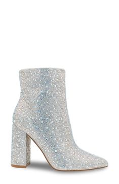 Sparkling crystals add undeniable glamour to a pointy-toe bootie lifted by a bold block heel. 3 1/4" heel 6" shaft Side zip closure Cushioned footbed Synthetic upper, lining and sole Imported Party Heeled Boots With 4-inch Block Heel, Evening Boots With 4-inch Block Heel, Party Boots With 4-inch Block Heel, Elegant Rhinestone Boots With Block Heel, Glamorous Evening Boots With 4-inch Heel, Elegant Rhinestone Block Heel Boots, Glamorous Sparkling Ankle Boots, Glamorous Formal Boots With Reinforced Heel, Glamorous Ankle Boot Heels With Reinforced Heel