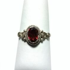 925 Sterling Silver Artisan Crafted Genuine Garnet Solitaire Style Ring. Never Worn. January Birthstone. Red Ruby Ring With Accent Stones In Sterling Silver, Red Sterling Silver Crystal Ring With Gemstone, Red Sterling Silver Jewelry With Birthstone, Red Crystal Gemstone Ring In Sterling Silver, Red Sterling Silver Birthstone Ring, Sterling Silver Jewelry With Red Birthstone, Nickel-free Oval Crystal Ring In Sterling Silver, Nickel-free Oval Sterling Silver Crystal Ring, Elegant Sterling Silver Nickel-free Crystal Ring