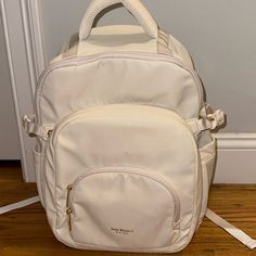 The Viral Tiktok Isaac Mizrahi Backpack Never Used, Brand New (No Tags) Gorgeous White/Cream Color With Gold Zippers So Spacious With So Many Compartments Cheap Cream Backpack With Adjustable Strap, White Softback Backpack For On-the-go, White Backpack With Removable Pouch For On-the-go, Functional White Bags With Adjustable Straps, Versatile White Large Capacity Backpack, Versatile Large Capacity White Backpack, White Functional Backpack With Adjustable Straps, Versatile White Travel Backpack, Versatile White Backpack For Travel