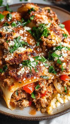 a close up of a plate of food with meat and veggies on it