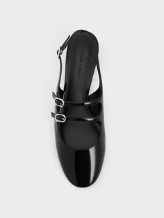 Step into timeless elegance with these Mary Janes in glossy black, which feature a distinctive double-strapped design. The sleek and polished finish exudes sophistication, while the distinctive yet delicate straps add a modern flair to this enduring shoe style. These Mary Janes also come with 4cm block heels to offer a sturdy stature boost - these shoes are great for both work and play. Luxury Office Mary Janes With Heel Strap, Luxury Mary Janes With Heel Strap For Office, Faux Leather Heels, Size Chart For Kids, Mary Jane Pumps, Charles Keith, Black Box, Shoe Style, Fall Style