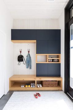 the entryway is clean and ready to be used as a storage area for shoes