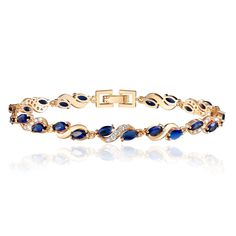 PRICES MAY VARY. Classic Elegant Design: Women's Bracelets are exquisitely cut with emerald Blue sparkling 3A gemstones and cubic zirconia, length 7.48inch/190mm, fashionable and elegant design, suitable for any age and style Highly Quality Material: The 18K gold-plated allergy-free copper bracelet is corrosion-, wear- and tarnish-resistant while possessing hypoallergenic, safe, and secure attributes Best Gift: The leaf bracelet comes with a beautiful box, ideal for birthdays, graduations, anniv Eternity Bracelet, Blue Sapphire Bracelet, 18k Gold Bracelet, Emerald Blue, Leaf Bracelet, Women's Bracelets, Diamond Tennis Bracelet, Gold Bracelet For Women, Bracelet Blue