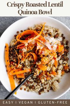 a white bowl filled with quinoa and carrots