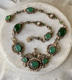 "Stunning Circa 1800s Victorian Austro Hungarian Green Chrysoprase Pearl Silver Gilt Royal Crown Antique Necklace Measures aprox 16 1/2\" Around Weighs 45.8 grams See pictures next to ruler fro scale has been tested and tests silver Although this is Hungarian pice it has a very unique Italian peruzzi feel" Victorian Jeweled Necklaces For Formal Occasions, Vintage Jeweled Oval Necklace, Vintage Oval Jeweled Necklace, Vintage Oval Jeweled Necklaces, Green Victorian Necklace For Wedding, Antique Green Jeweled Necklace, Antique Green Jeweled Necklaces, Antique Green Necklaces For Weddings, Victorian Oval Green Necklace