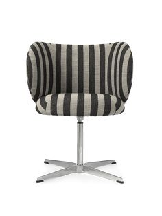 a black and white striped chair sitting on top of a metal base