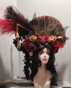 This Fan and flower headpiece  is unquestionably unique and one of a kind handmade by me.   It is inspired by my love of red and gold colors.  It is made from high quality silk flowers in red golds and black.   The fan is approximately 13 inches in height and sits slightly to the side to allow for the beautiful cascading flowers.  It has beautiful high quality crystals, dangle rhinestones in a clear silver tone pallet and hand dyed gold tasiles.  There's even a dragon head handpainted in gold and butterflies in black  All this beauty sits on my signature headband design for comfort.  The entire piece sits on top of your head.    Definetly get you noticed perfect for a wedding or cosplay or a dancer. Would make a beautiful theater headpiece or photographer prop or a Fairy.  This style to ma Red Tall Crown Costume Hat For Party, Red Crown Headpiece For Parties, Red Crown Headpieces For Party, Red Festival Crown Headpiece, Red Fantasy Headpiece For Costume Party, Fantasy Red Headpiece For Costume Party, Red Bohemian Headpiece For Party, Bohemian Red Headpiece For Party, Red Fantasy Costume Headpieces