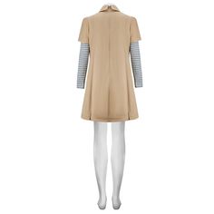 a mannequin wearing a beige coat and white tights, with striped sleeves