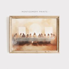 a group of people sitting at a long table with the word montgomery prints above them