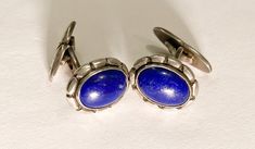 We offer a lovely and rare pair of Art Nouveau style Georg Jensen Sterling Silver and Lapis  cufflinks. These are pattern number 33 and were designed by Georg Jensen before 1910. These were made in the early 1930's. The Lapis  and Silver is in perfect condition, there are no cracks, scratches or any other flaws.  The face of the cufflinks is approx 3/4 inch by 1/2 inch and they weigh approx. 12 grams. These number 33 cufflinks are a little smaller and lend themselves to ladies French cuffs as we Laura May, Mid Century Scandinavian, French Cuff, Art Nouveau Style, Georg Jensen, San Antonio Tx, Tie Accessories, Cuff Links, Suit And Tie