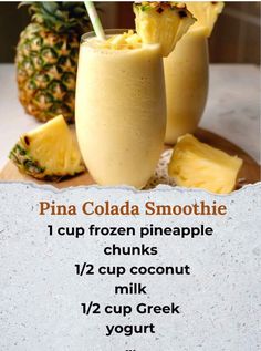 a pineapple smoothie is served in two glasses