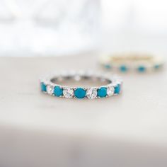 This gorgeous two-stone eternity ring can add a pop of color to any look with the stunning Turquoise stones, while still having the beautiful shine from the CZ stones! Made of 925 Sterling Silver THICK plating of 14k Gold or Rhodium Available in Sizes 4-12 Made of highest quality cubic zirconia and lab-created turquoise 3mm Stones VERY HIGH QUALITY Nickel-free & Hypoallergenic - will NOT turn fingers green! Ring Sizer Tool 🎁 Comes in a gift-box, ready for gift giving!✈️ Ships same day for fast Turquoise Gold Ring, Green Ring, Turquoise Stones, Ring Sizer, Ring Size Guide, Cz Stone, Turquoise Stone, Eternity Ring, Precious Metals