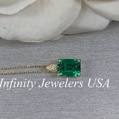 "The pendant pictured is a lab created emerald and diamond #6648 -Approximate total carat weight: approx. 2.55ctw diamond equivalent -Center Stone Size: 9x7mm - approx. 2.50ct diamond equivalent -Center Stone Shape: emerald cut -Gem Type: lab created emerald -Stone Clarity: VS2 -Stone Color: Green -Moh's Scale: 8.5 hardness -Accent Stone Size: round approx. 0.04ct. diamond equivalent -Gem Type: genuine diamond -Stone Clarity: SI1 -Stone Color: G -Moh's Scale: 10 hardness -Metal Type and Purity: Classic Diamond Emerald Necklace As Gift, Emerald And Diamond Necklace For Formal Occasions, Formal Emerald And Diamond Necklace With Birthstone Detail, Formal Emerald Diamond Necklace With Birthstone, Classic Cubic Zirconia Emerald Necklace, Cubic Zirconia Emerald Necklace With Prong Setting For Anniversary, Emerald Diamond Necklace Fine Jewelry, Cubic Zirconia Emerald Necklace For Anniversary, Exquisite Emerald Necklace With Prong Setting