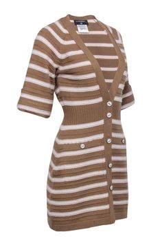 This luxurious Chanel Pre-Fall 2015 stripe cashmere sweater dress, flaunted by supermodel Gisele Bundchen, offers the epitome of cozy chic. The textured fabric, cinched waist, and ivory enamel buttons introduce a perfect blend of style and function while accentuating your figure. Style this versatile dress with knee-high leather boots and a statement crossbody bag for a stylish day-to-evening look. Size 36 Shell 100% Cashmere Unlined White button closures w/ satin nickel border Two front patch p Chic Luxury Cashmere Sweater Dress, Luxury Cashmere Sweater Dress, Elegant Style, Beige Knitted Knee-length Sweater Dress, Luxury Ribbed Knit Sweater Dress, Luxury Ribbed Knee-length Sweater Dress, Cashmere Sweater Dress, French Girl Chic, Buy Shoes Online, Gisele Bundchen