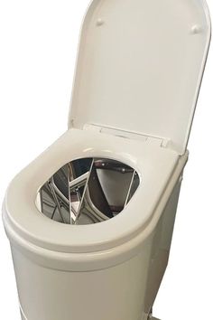 a white toilet with its lid open and some metal parts sticking out of the seat