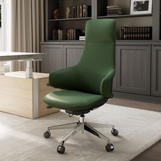 a green office chair sitting on top of a white rug in front of a bookcase