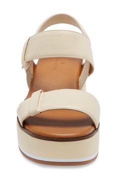 A lofty platform brings just-right height to an easygoing sandal perfect for any warm-weather occasion. 2 3/4" heel; 1 1/2" platform (size 8.5M) 3" strap height Adjustable ankle strap with hook-and-loop closure Leather upper and lining/rubber sole Imported Women's Shoes Spring Double Strap Cushioned Wedge Sandals, Spring Double Strap Wedge Sandals With Cushioned Footbed, Synthetic Double Strap Wedge Sandals With Heel Strap, Casual Double Strap Wedge Sandals With Heel Strap, Casual Wedge Sandals With Double Strap, Casual Slingback Sandals With Platform Block Heel, Casual Platform Slingback Sandals With Block Heel, Synthetic Double Strap Platform Wedge Sandals, Chic Spring Wedge Sandals With Adjustable Strap