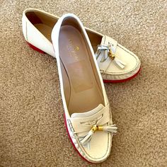 Nwot Size 9 White Soft Pebble Leather And Pink Rubber Sole Loafers/ Flats. Has Been Sitting In My Closet And Has Never Been Worn. There Is A Small Puncture (The Size Of A Dot) On The Exterior Of The Left Shoe That May Have Been Due To Being Open Box But Otherwise So Signs Of Damage. Item Will Not Come With A Box. Please Feel Free To Ask Any Questions! White Round Toe Flats For Office, White Flats With Textured Sole For Work, White Loafers With Removable Insole For Spring, White Synthetic Loafers For Office, White Flat Loafers For Office, White Flat Office Loafers, White Almond Toe Loafers For Spring, Casual White Flats For Workwear, Casual White Flats For Work