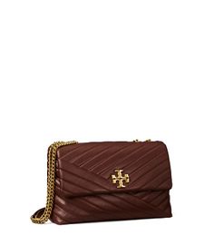 Directly from Tory Burch - The Kira Convertible Shoulder Bag is made of soft chevron-quilted leather with beveled Double T hardware. An adjustable chain strap adapts in the moment - doubled over the shoulder, or long and crossbody. Tory Burch Official Site. Tory Burch Kira Quilted Small Satchel, Kira Chevron Convertible Shoulder Bag, Tory Burch Kira Chevron Camera Bag, Tory Burch Quilted Purse, Tory Burch Kira Chevron Bag, Tory Burch Crossbody Matte Bag, Tory Burch Kira Chevron, Kira Chevron, Tory Burch Kira