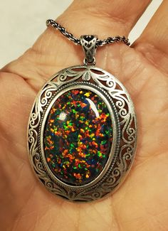 "Beautiful Black Opal Vintage Style Necklace, Huge 18x25mm Lab Created Favorite Opal, See Video! Photos Taken In Natural As Well As Indoor Lighting. Antiqued Sterling Silver Vintage Style Pendant, 18\" Matching Sterling Chain. Gift Box Included.  *This One Is For Lovers Of Big Bold Jewelry, Make Sure Recipient Is That Person! I Have This Stone In A Simple Pendant Also" Multicolor Cabochon Jewelry For Gift, Multicolor Oval Spiritual Necklaces, Spiritual Oval Multicolor Necklaces, Spiritual Multicolor Cabochon Necklace, Black Opal Necklace, Colorful Fire, Vintage Style Necklace, Simple Pendant, Bold Jewelry