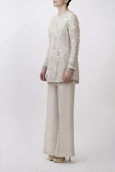 Mumu Mandarin Silk Palazzo Set For Reception With Long Sleeves, Embellished Palazzo Set For Reception, Elegant White Festive Pants, Elegant Festive Pants For Reception, Festive Wedding Pants With Mirror Work, Silk Palazzo Set With Sequins For Reception, Elegant Palazzo Set With Pearl Embroidery For Parties, Elegant Pants For Eid Reception, Wedding Pant Set With Straight Pants