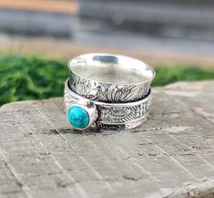 Lovely Turquoise Spinner Ring, 925 Silver Spin Ring,Flower Band Spinner, Thumb Spinner Engagement Ring, Ring For Women, Meditation Gift Item Description Metal :- 925 Sterling Silver Style : Band Ring Gemstone:- Aqua Chalcedony  Benefits Of Aqua Chalcedony  Chalcedony has the power to soothe self-doubt and bring inner peace to the wearer. It is believed that blue chalcedony helps in calming and centering the emotional energy, while encouraging the wearer to acquire tranquility. Healing: This gem Stamped Turquoise Rings For Gifts, Adjustable Stamped Sterling Silver Turquoise Ring, Adjustable Stamped Turquoise Ring In Sterling Silver, Sterling Silver Stamped Turquoise Ring Gift, Gift Turquoise Sterling Silver Ring, Spin Ring, Emotional Energy, Spinning Rings, Flower Band