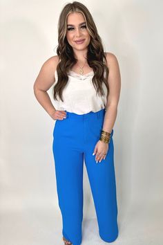 Let's get down to business in these pants! They are the perfect power pant. They feature a high waistline, side pockets, front zip button closure, and elastic banded waistline. Self: 95% POLYESTER/5% SPANDEX , LINING: 100% POLYESTER Small fits 2-6 Medium fits 8-10 Large fits 12-14 Machine wash cold, lay flat to dry Sydney is in a LARGE Lay Flat, Sydney, Size 12, Spandex, Elastic, Pants, Trousers