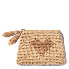 a straw bag with a heart on it