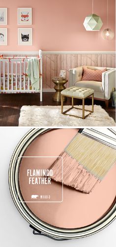 the interior of a baby's room painted in pink and white with gold accents