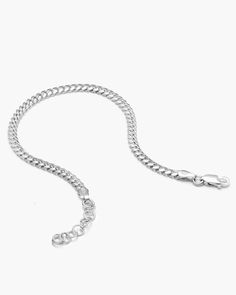 Our thinnest 3mm sterling silver Cuban Link Bracelet is designed to be lightweight and comfortable for you to look and feel effortless in it every day. Made with an adjustable length to tailor to your wrist. JAXXON 3mm Women's Cuban Link Silver Bracelet | 6.5"/7.5" Classic Adjustable Silver Chain Charm Bracelet, Minimalist Adjustable Sterling Silver Bracelet With Lobster Clasp, Classic Adjustable Sterling Silver Bracelet With Silver Chain, Minimalist Silver Charm Bracelet With Extender, Adjustable Sterling Silver Bracelet With Polished Finish For Everyday, Classic Sterling Silver Bracelet With Adjustable Chain, Classic Sterling Silver Bracelet With Extender, Cuban Link Bracelet, Solid Gold Chains