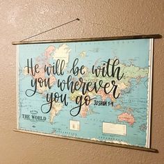 a map with the words he will be with you wherever you go and the world on it