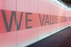 a pink wall with the words weve written on it