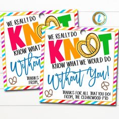 two colorful tags that say we really do know what to do with the wedding rings