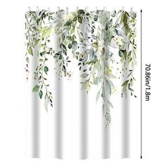 a white shower curtain with green leaves hanging from it's side, and measurements