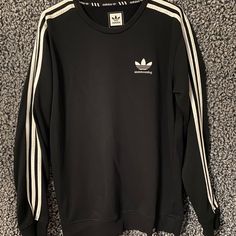 I Have A In Brand New Condition Adidas Crewneck. It’s Only Been Worn Once So It’s In Excellent Condition. It’s The Adidas Skateboard Line. This Sweater Is In A Men’s Size Small, But I’m Female And Purchased For Myself So Can Be Worn Unisex And Fit Or Be Oversized. It Measures 20” From Pit To Pit. **If U See Something You Like Grab It! Message Me On Bundles! And If You Need To, Make An Offer! I’m Here To Sell So I’m Sure We Can Arrive On A Price! Adidas Crewneck, Adidas Sweater, Sweaters Crewneck, Adidas Black, Black Adidas, Colorful Sweaters, Adidas Women, Adidas Men, To Sell