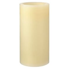 a white pillar candle on a white background