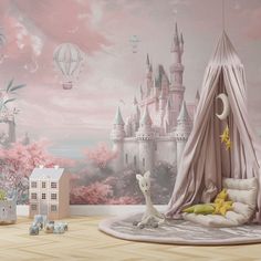 a child's bedroom decorated in pink and white with a castle mural on the wall