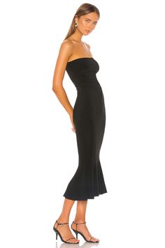 95% poly, 5% spandex Partially lined Stretch fit Back vent Neckline to hem measures approx 35" in length Imported Model in size S. Stretch Midi Dress Lined, Stretch Lined Midi Dress, Stretch Midi Dress With Lining, Stretch Lined Midi Dress For Date Night, Lined Stretch Midi Dress For Date Night, Stretch Lined Bodycon Midi Dress, Stretch Midi Length Lined Bodycon Dress, Stretch Bodycon Midi Dress With Lining, Fitted Midi Bodycon Dress Lined