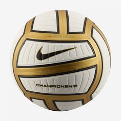 a white and gold soccer ball with the word championship written on it's side