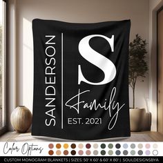 a black and white personalized blanket with the letter s on it