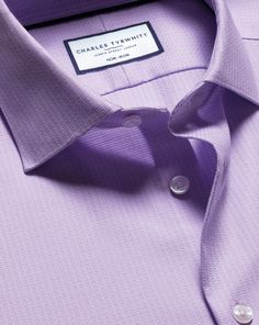 100% cotton with natural stretch, Available in classic, slim and extra slim fit, Non-iron, Semi-spread collar, Classic and slim fit: back pleats, Extra slim fit: back darts, Rounded button cuff with one button, Machine washable - Semi-Cutaway Collar Non-Iron Stretch Texture Grid Shirt - Lilac Purple | Men's Charles Tyrwhitt Semi-Cutaway Collar Non-Iron Stretch Texture Grid Dress Shirt - Lilac Purple Single Cuff Size Medium Cotton Classic Wrinkle-resistant Shirt For Spring, Solid Slim Fit Shirt With Spread Collar, Fitted Tops For Business Casual, Fitted Collared Timeless Top, Fitted Timeless Collared Top, Timeless Fitted Collared Top, Solid Slim Fit Business Shirt, Solid Slim Fit Shirt For Business, Tailored Short Sleeve Formal Tops