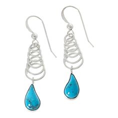 Jay King Sterling Silver Kingman Turquoise Earrings Dangling from a sterling silver, spring-shaped spiral design, drops of beautiful Blue Basin Kingman turquoise give these handcrafted earrings a fun, playful vibe. From Jay King.       Approx. 1-11/16"L x 3/8"W      Stamped .925     Pierced with wire backs     Sterling silver earrings have spring-shaped spiral drops with stylized teardrops of blue Kingman turquoise dangling from base     All stones bezel-set   Stone Information       All sizes a Turquoise Drop Sterling Silver Jewelry, Turquoise Sterling Silver Long Drop Jewelry, Hypoallergenic Turquoise Drop Jewelry, Hypoallergenic Spiral Sterling Silver Jewelry, Unique Spiral Turquoise Jewelry, Hypoallergenic Turquoise Teardrop Earrings In Sterling Silver, Blue Spiral Sterling Silver Jewelry, Turquoise Sterling Silver Long Drop Earrings, Turquoise Long Drop Sterling Silver Earrings