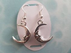 Gorgeous Celestial half moon, drop earrings. Suitable for winter solstice and all year around. There is a matching necklace Please check the listing below. https://www.etsy.com/uk/listing/648388547/celestial-moon-necklace-halloween-world?ref=listing-shop-header-2 These can be customised just message me for details. Materials Tibetan Silver Silver Plated Hooks Postage All items will be sent first class. The estimated delivery will be between 1- 3 days (UK) and out side the UK it will be 7 -14 day Hypoallergenic Moon-shaped Jewelry Gift, Hypoallergenic Half Moon Jewelry Gift, Adjustable Hypoallergenic Crescent Jewelry, Gift Moon Charm Round Earrings, Gift Round Moon Charm Earrings, Handmade Adjustable Half Moon Earrings, Handmade Half Moon Earrings, Gift Round Earrings With Moon Charm, Hypoallergenic Moon Shaped Earrings Gift