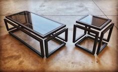 two glass tables sitting on top of each other in the middle of a floored room