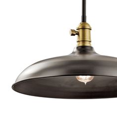 an industrial style pendant light with a black and gold finish on the bottom, hanging from a ceiling fixture