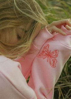 The "To Live For the Hope of it All" Hoodie is crafted from top-quality fabrics, while having an exquisite embroidery art of fine-detailed butterflies. The PPP palm embroidered above our hearts is a symbol of unity within the Pink Palm Puff community, reminding us all of the love we share. Pink Sweatshirt With Embroidered Logo For Spring, Pink Hoodie With Embroidered Logo For Spring, Pink Embroidered Hoodie For Fall, Pink Hooded Tops With Custom Embroidery, Spring Pink Sweatshirt With Embroidered Graphics, Pink Embroidered Sweatshirt For Spring, Spring Embroidered Sweatshirt For Streetwear, Palm Prints, Crop Top Dress