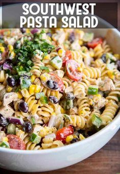 this southwest pasta salad is loaded with chicken, black olives, tomatoes, corn, and cilantro