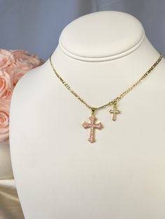 Add a touch of elegance and faith to your jewelry collection with this stunning 14k gold filled double cross necklace. The standout piece features a large cross pendant adorned with shimmering opal shell detailing, complemented by a delicate cubic zirconia cross charm. Perfect for adding a glamorous touch to any outfit, this necklace is sure to make you shine bright wherever you go. Ideal for those who want to showcase their faith with style and sophistication.17.5 inch length with optional 2 in Cross Necklace Pink, Double Cross Necklace, Shell Cross, Cross Pendent, Christian Board, Pink Cross, Luxe Jewelry, Friendship Jewelry, Catholic Jewelry