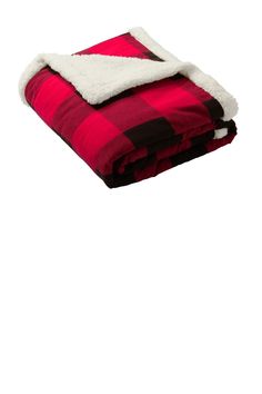 a red and black plaid blanket with white sherpam on top that is folded over